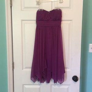 Purple flowy dress . Gems on the top . Padded bra.